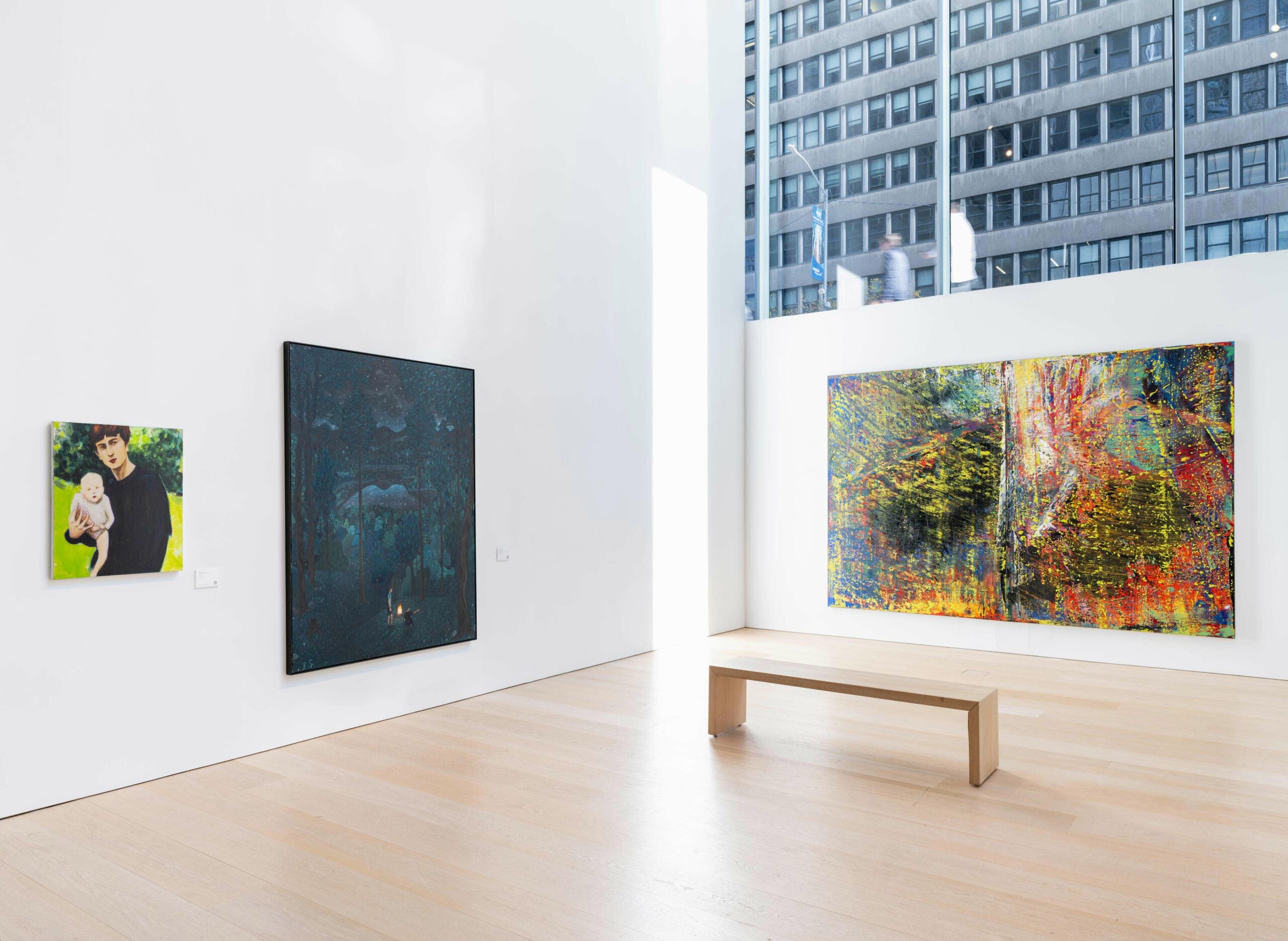 Exhibition view of a large abstract colorful painting by Gerard Richter.